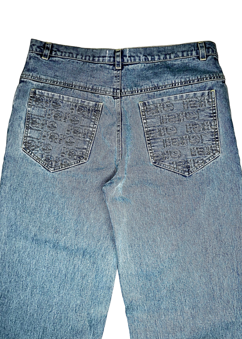 Back view of blue jeans with text pattern on the pockets against a white background